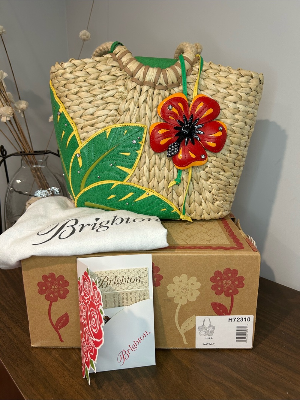 Brighton Woven Hula Straw Tote with Green Leaf Appliqué & Red Flower Charm